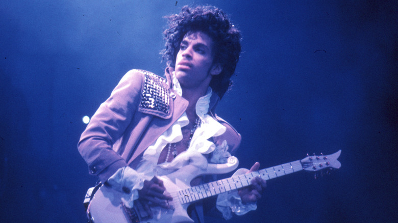 Prince playing guitar
