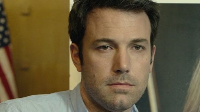 Ben Affleck posing for photo in Gone Girl