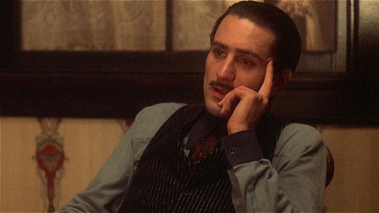 Young Vito Corleone thinks near a window in The Godfather Part II (1974)