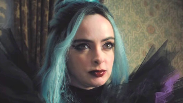 Natacha (Krysten Ritter) with blue hair in Nightbooks