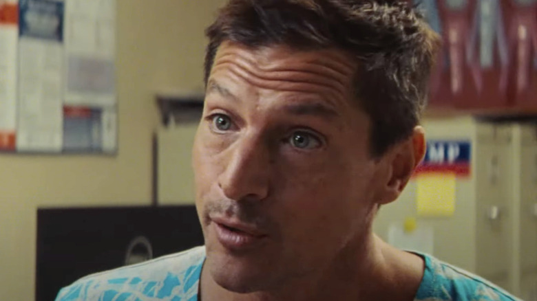 Simon Rex in blue tie-dye shirt in Red Rocket