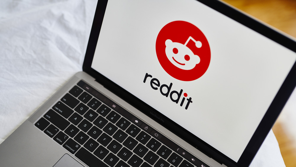 Reddit logo on laptop screen