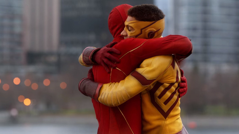 Kid Flash hugs The Flash