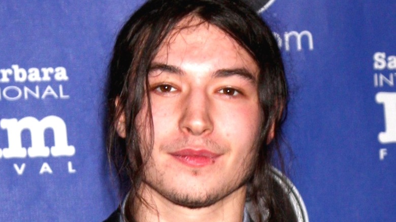 Ezra Miller posing for a photo