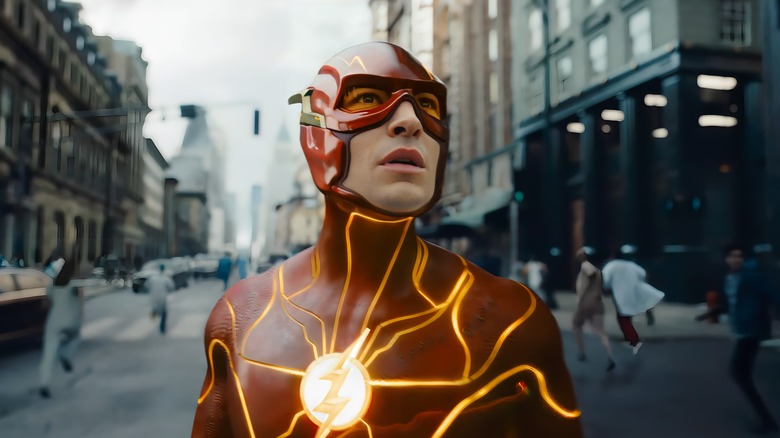 The Flash looks up in a street 