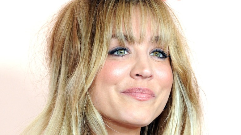 Kaley Cuoco looks tense with bangs