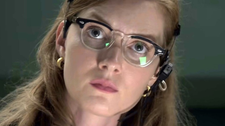 Margo Madison wearing glasses and headset 