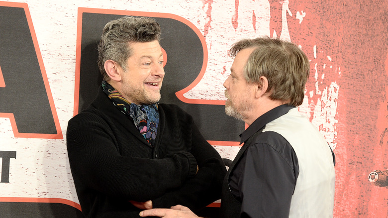 Andy Serkis grinning at Mark Hamill