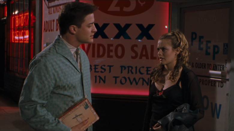 Adam and Eve outside an adult store