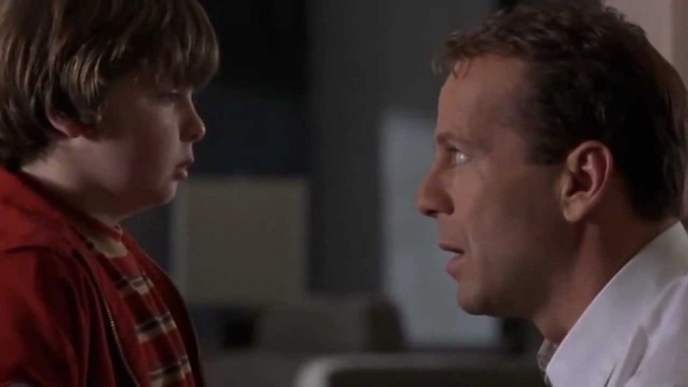 Russ (Bruce Willis) meets his younger self in Disney's The Kid