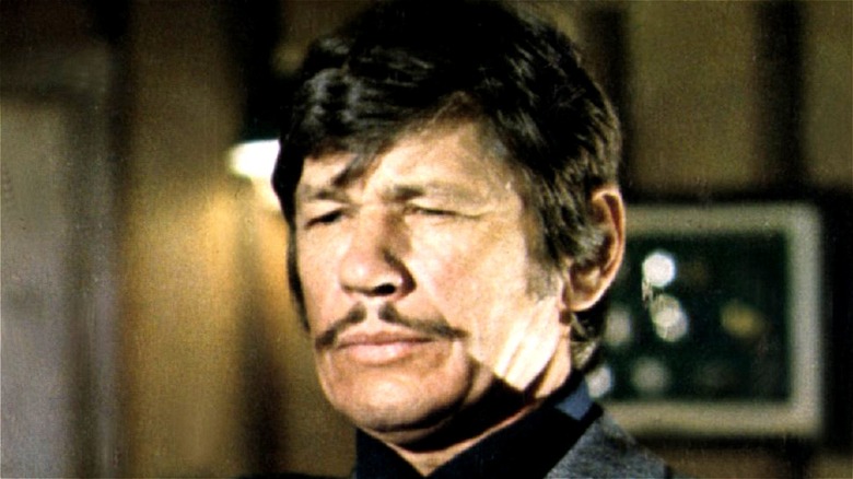 Charles Bronson looking suspiciously