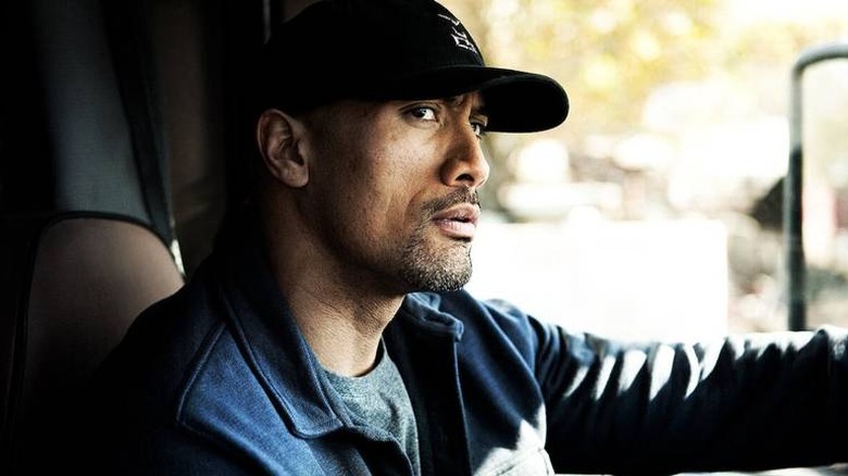 Dwayne Johnson in a car