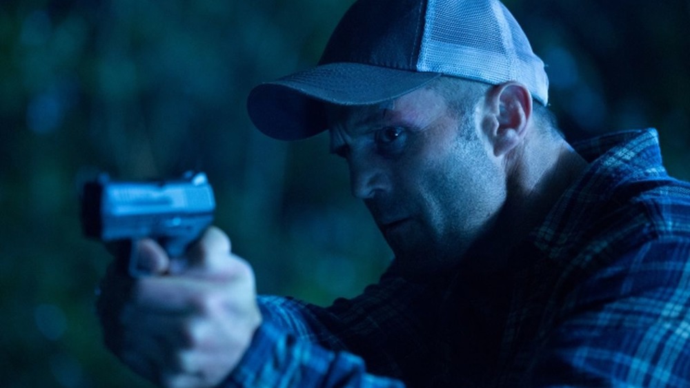 Phil Broker pointing gun
