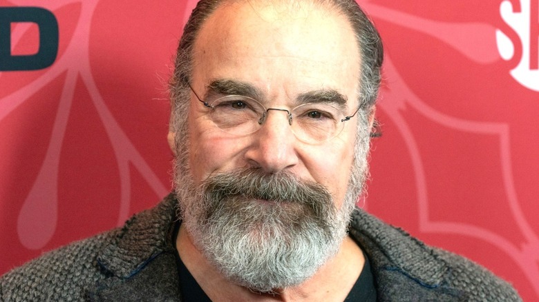 Mandy Patinkin looking into camera