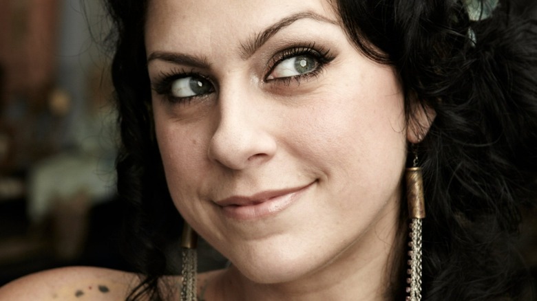 Danielle Colby smirking