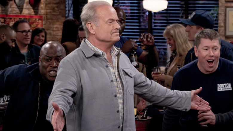 Frasier arms open in bar