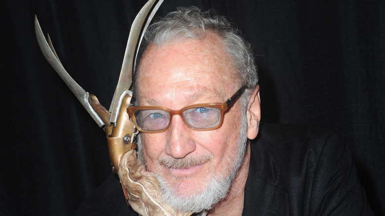 Robert Englund with Freddy Krueger claw