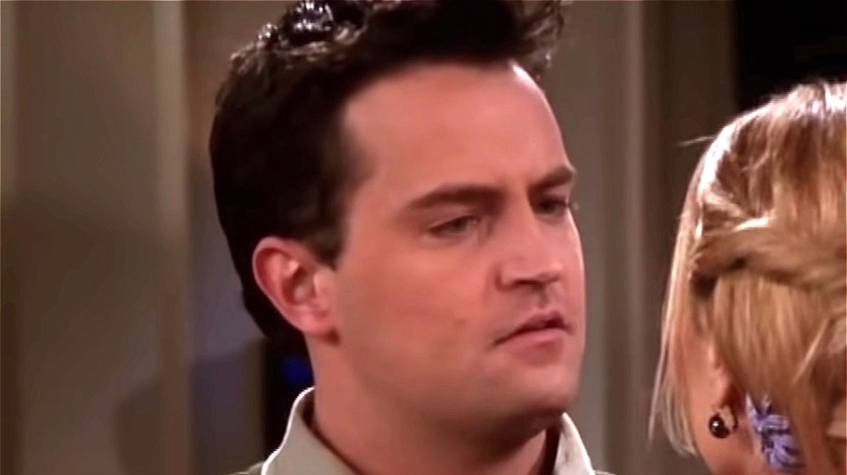 Chandler awkwardly stares at Phoebe