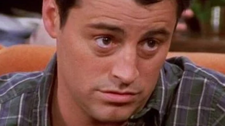 Joey Tribbiani raising his eyebrows