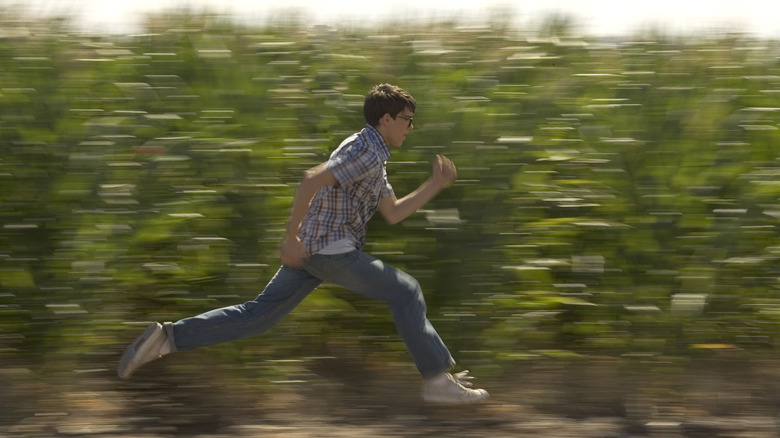 Young Clark Kent running