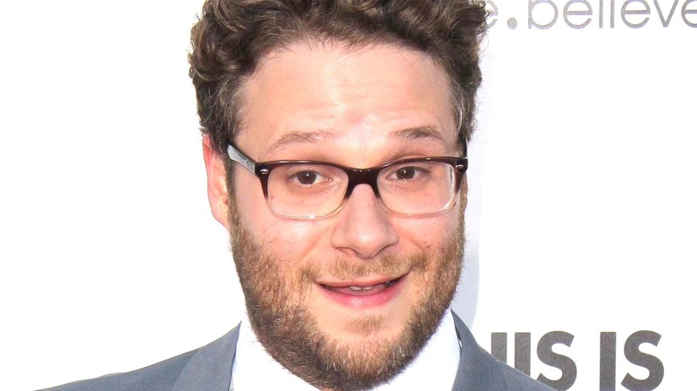 Seth Rogen wearing glasses and smiling