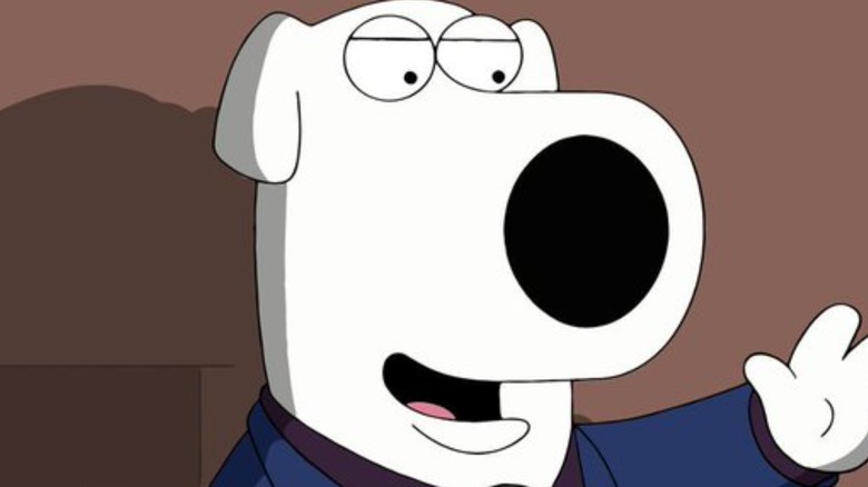 Brian Griffin on stage with a mic