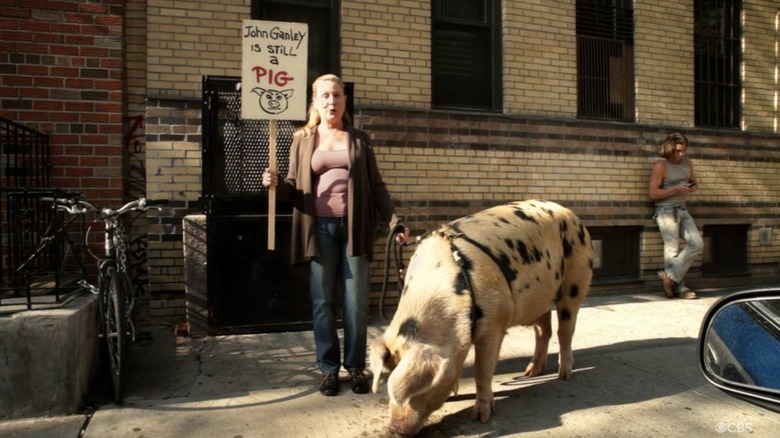 Woman protesting on Blue Bloods