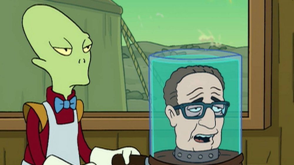 Kif wheels Henry Kissinger to his scene on Futurama