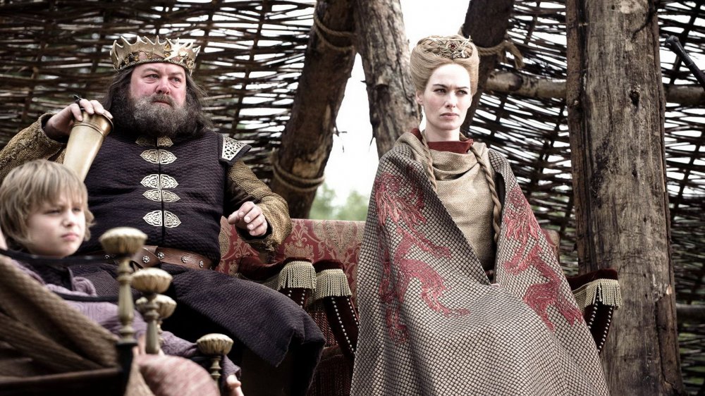 Mark Addy and Lena Headey as Robert Baratheon and Cersei Lannister on Game of Thrones