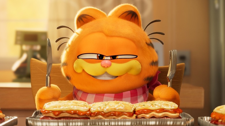 Garfield smirking with lasagna