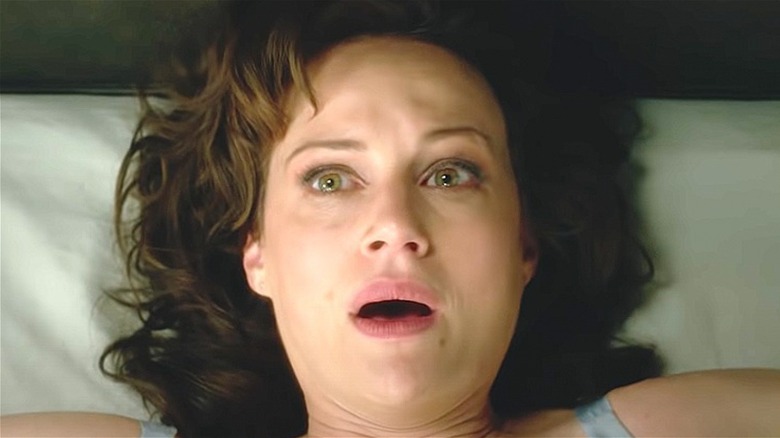 Carla Gugino looking terrified