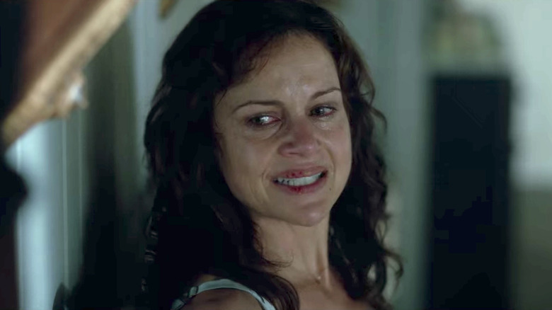 Carla Gugino gritting her teeth