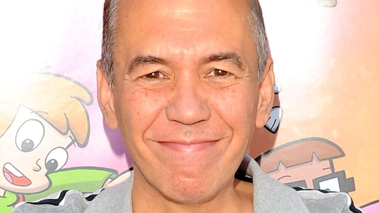 Gilbert Gottfried gray shirt