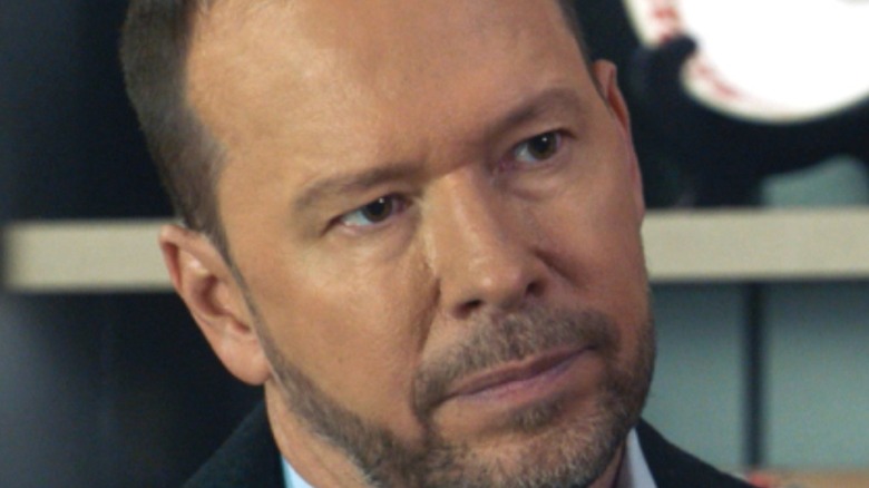 Donnie Wahlberg contemplating