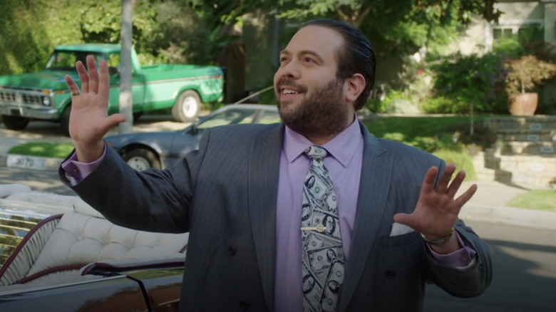 Marvin Goldberg wears a gaudy suit