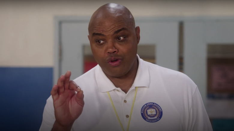 Charles Barkley raises his hand