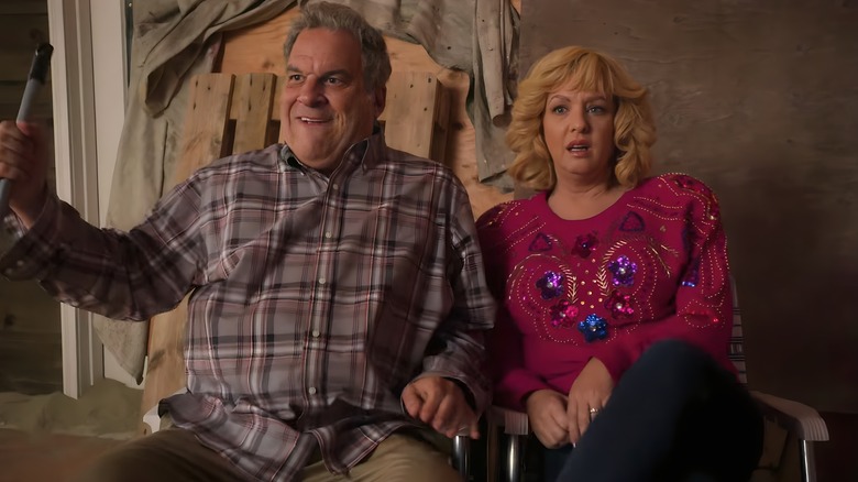 Murray and Beverly sitting in beach chairs looking excited