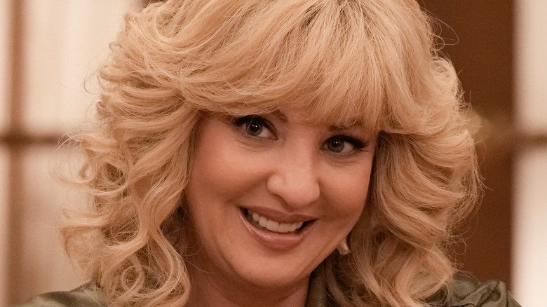 Wendi McLendon-Covey as Beverly in The Goldbergs smiling