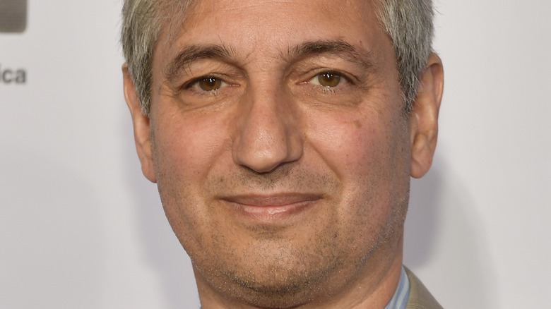 David Shore smiling slightly