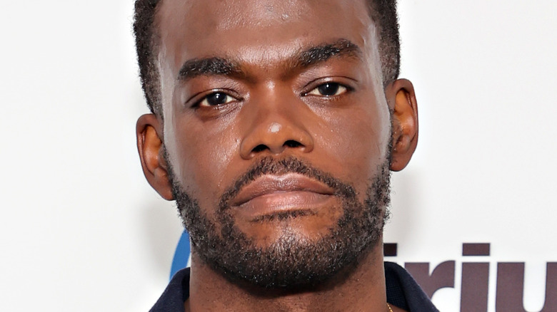 William Jackson Harper smirking