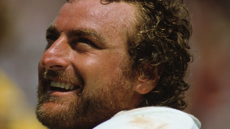 John Matuszak tackling Wilbert Montgomery