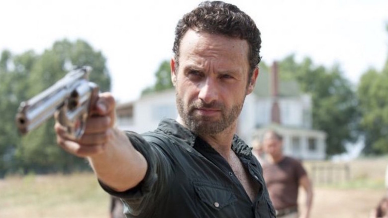 Rick Grimes holding a gun