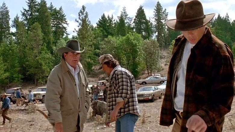 James Garner searches in woods