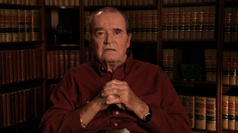 James Garner sits in a library