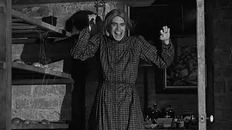 Norman dressed as his mother