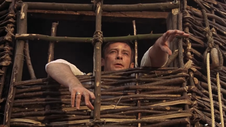 Howie trapped in wicker man