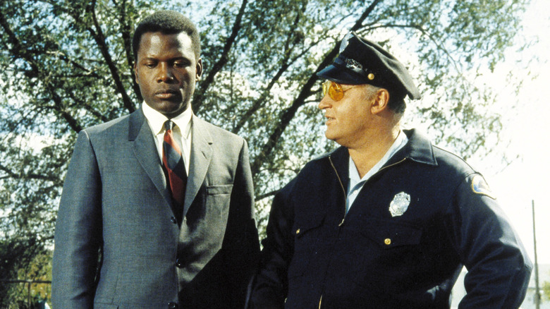 Virgil Tibbs and Bill Gillespie standing outside