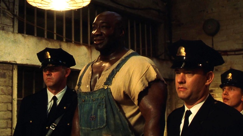 Tom Hanks and Michael Clarke Duncan looking down the hall