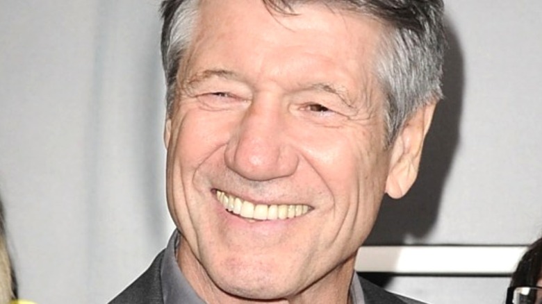 Actor Fred Ward smiling at event