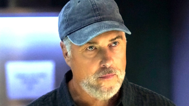 Grissom wearing a baseball cap